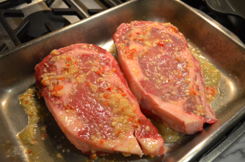 strip steak - steak in marinade